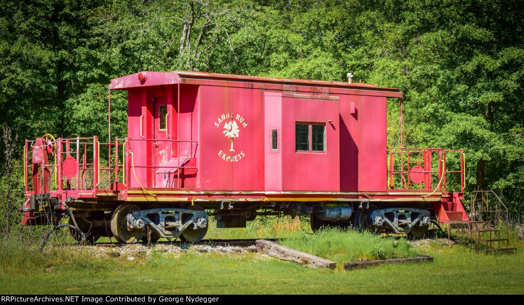 Unknown Caboose. I could not see any reporting marks or numbers